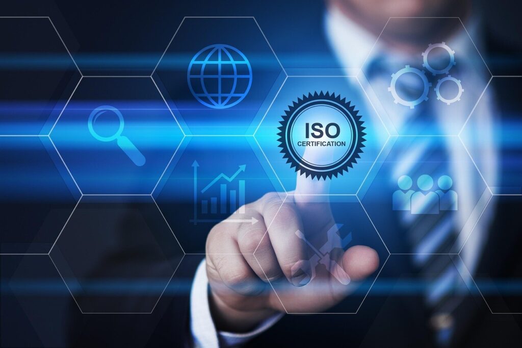 A businessman points to an ISO certification mark.