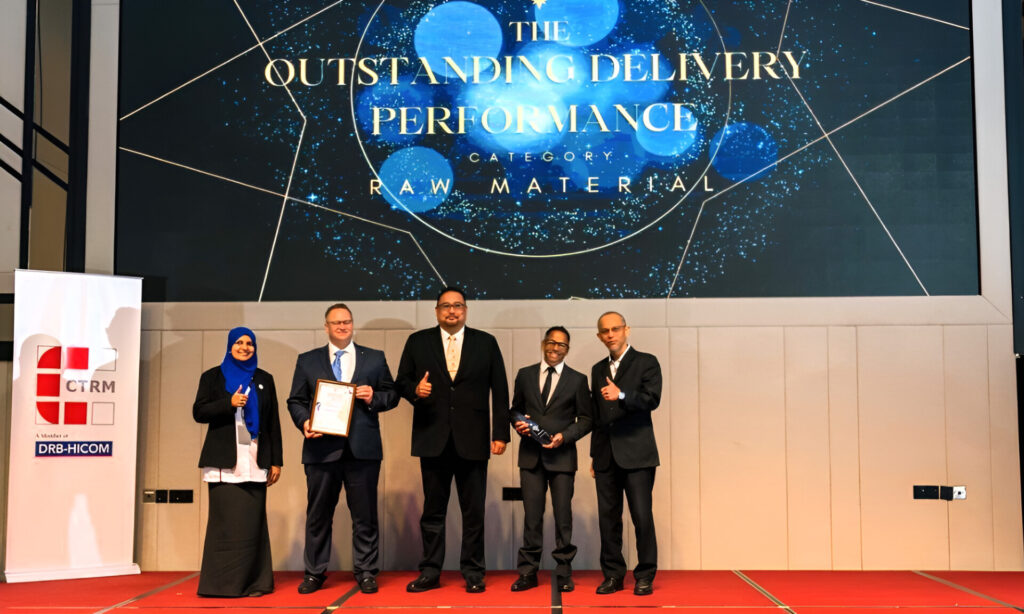 Group photo of award winners at an award ceremony