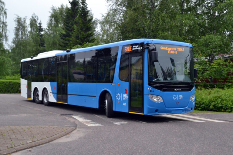 Public bus in light blue with green background