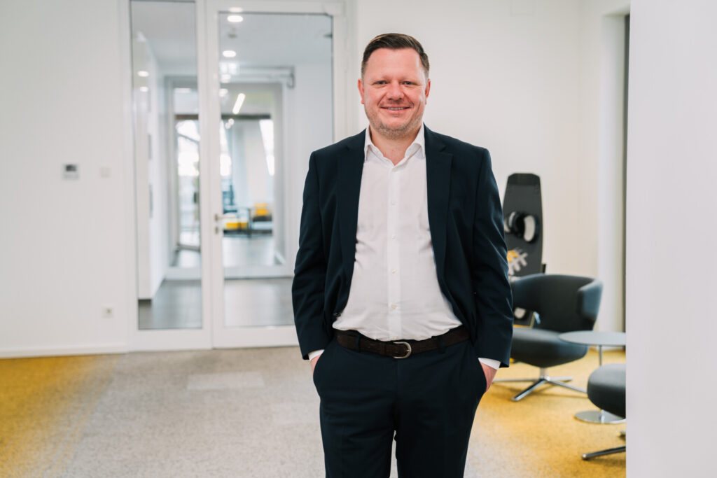 Man standing in a modern office